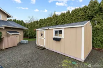 Outbuilding and extra parking space