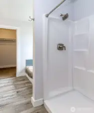 The primary bath has a large step-in shower.