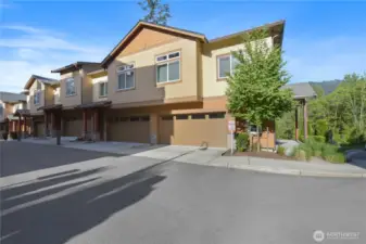This residence features a spacious two-car garage and offers peaceful mountain living with modern convenience.
