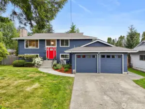 Beautifully updated 5-bedroom home with fresh 2025 exterior paint, welcoming curb appeal, and a spacious driveway.