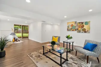 Cozy up by the gas fireplace in this expansive bonus room—ideal for game nights, movie marathons, or relaxing after a long day.