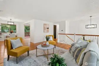 Gather with ease in the open-concept living and dining space—bright, welcoming, and perfect for everyday living or entertaining.