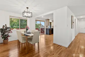Dining area with easy indoor-outdoor flow—sliding doors lead to the entertainment-sized deck.