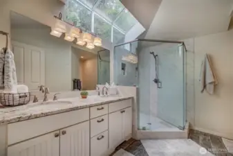 Primary bedroom bathroom with walk-in shower & double sinks