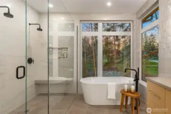 Large walk in shower with duel heads and frameless glass enclosure