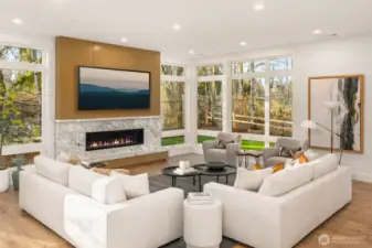 Great Room Flooded with natural light through walls of windows and 10 foot ceilings
