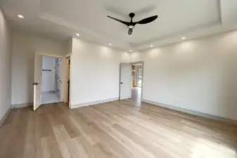Primary Ensuite showing walkin closet and bath