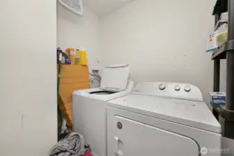Laundry in both units (lower unit laundry shown in photograph).