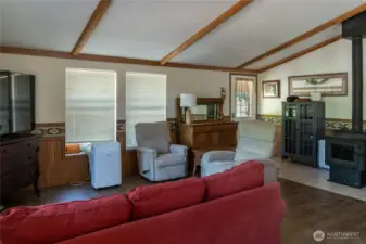 Looking towards front door. Kitchen is behind. Hallway w/2bed 2bath to the right.