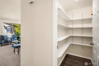 Walk-in pantry off the kitchen.