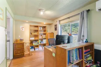 Den/office space near kitchen and living room