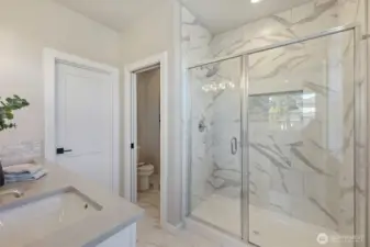 Primary Bathroom. Pictures depict a previously built home similar to the home going to be built on this lot. Floor plans, Elevations, colors, upgrades & materials may be different.