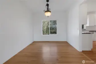 Formal dining room sits adjacent to your living room and right off of the gourmet kitchen.  You'll enjoy a nice territorial view of the greenbelt from the dining room.