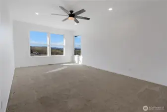 Upstairs, you'll find your huge Master Suite boasting partial views of Sinclair Inlet, Manette Bridge, Olympics, Ferrys, and City Lights.  Recessed lighting, remote ceiling fan, and 5-piece bath.  The perfect place to unwind from a long day.