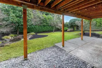 Walk out into the amazing backyard that includes fruit trees and a pond!