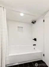 Refreshed shower on the lower level