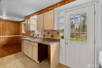 Backdoor off kitchen.