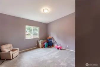 Second bedroom – bright and spacious with plenty of natural light.