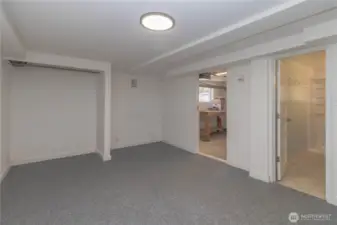 Additional flex space with door to shop area and fully updated bathroom with walk-in shower