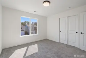 On the opposite side of the house are the other 2 bedrooms, nice and private