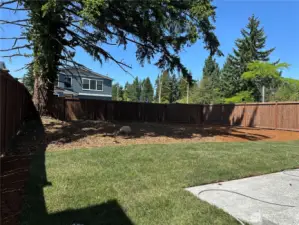 A spacious rear yard, enjoy those wonderful Pacific Northwest summer days!