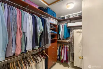 Primary walk-in closet has built-ins