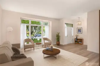 Living room has stunning LVP floors and all new paint and trim