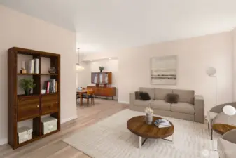 Another room of the living room leading into the dining room. Stylish new floors and new trim on the entire first floor.