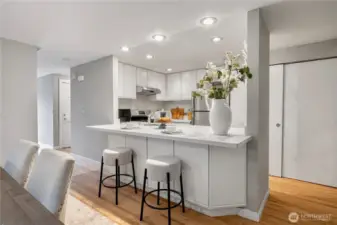 Updated kitchen featuring stainless steel appliances and contemporary finishes