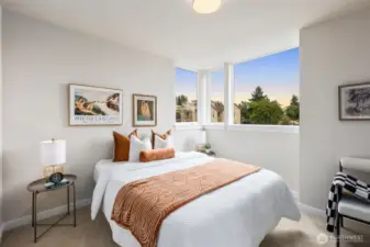 Upper level bedroom is perfect for guests to enjoy.  Next to this bedroom is a full bathroom.