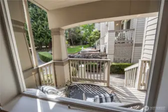 Covered front porch to sit and relax!