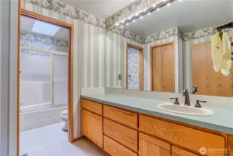 Full bath with linen closet