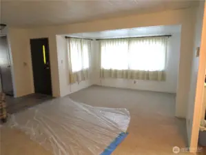 Living room with tip out see the new carpet