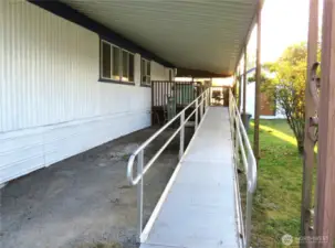 Newly installed ramp to back deck under carport