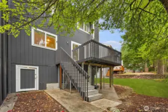 Back of townhome. Door access to the crawl space.