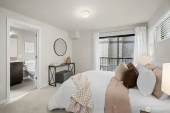 Primary Suite with its own Julliette balcony that is facing the Sound.