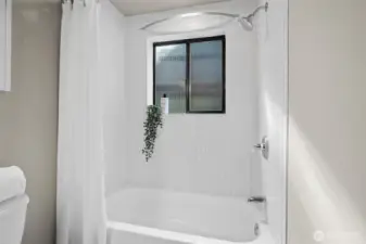 Primary bathroom shower/bath.