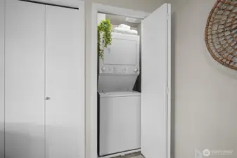 There is a convenient stacked laundry in the second bedroom.