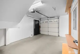 The attached one-car garage provides everyday convenience with storage you cannot see here to the left and to the right in the photo.