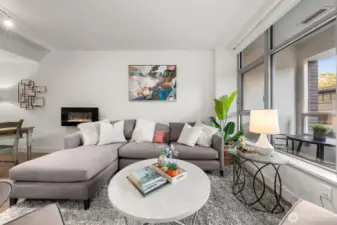 Living room with electric fireplace.