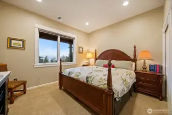 The second bedroom is also large and can accommodate a king-size bed and two nightstands along with a large dresser. It also takes in the amazing bay and island views.