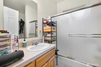 Main floor full bath with laundry room