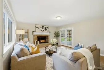 The open flow allows the family room to remain connected to the rest of the home while still feeling like its own comfortable escape. A huge covered patio waits just beyond the doors.
