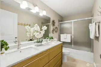 Quality materials and careful design choices help the spaces feel both functional and stylish. The bathrooms are well positioned throughout the home for convenience and ease of use.