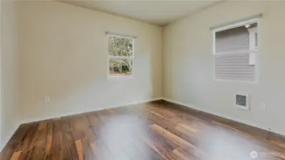 Bright 2nd bedroom that can easily adapt to your lifestyle needs.