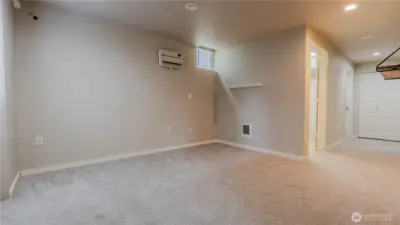 Flexible bonus room that can be used as a playroom, hobby room, workout space, or additional living area.