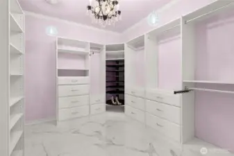 Custom designer closet in primary.