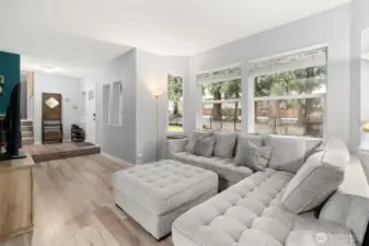 Enjoy your cozy living room while you take in the trees and nature outside!