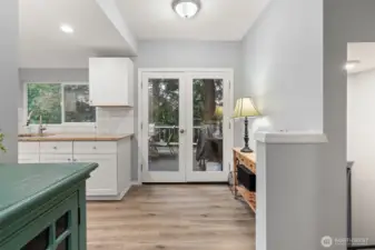 Enjoy french doors leading to your patio in the trees!