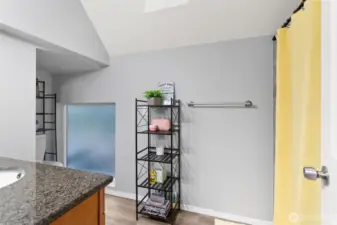 One of the full bathrooms also has vaulted ceilings and a skylight!